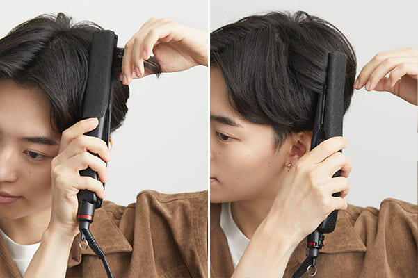 ストレートアイロンを使って前髪のセットをしている男性